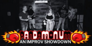 Text reads: Pandamonium: An Improv Showdown Image contains the wordmark pandamonium an improv showdown in black and white font, inbetween two flaming boxing gloves punching into the words. Image above text includes several people on stage at LIP, including a small stuffed panda on a chair.
